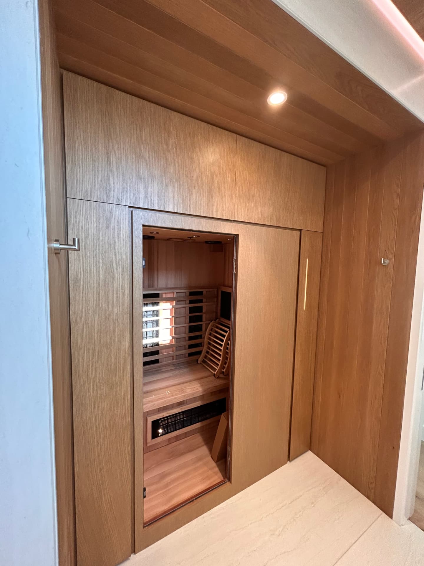 Built-in cedar sauna with integrated lighting